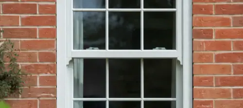 Sternfenster Regency vertical sliding sash window featuring slim sightlines, decorative sash horns and authentic heritage detailing.